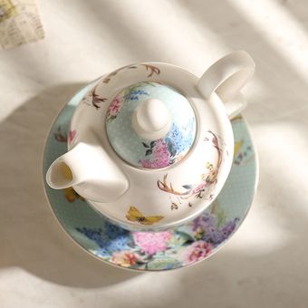 juegos de t una tetera y una taza Juego de té de cerámica portátil 