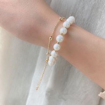 Conjunto de pulseras de perlas naturales de estilo simple dos pulseras exquisitas 