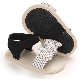 Zapatos de lazo bonito para bebé Sandalias de tela de algodón para niño pequeño zapatos planos antideslizantes nuevo estilo 