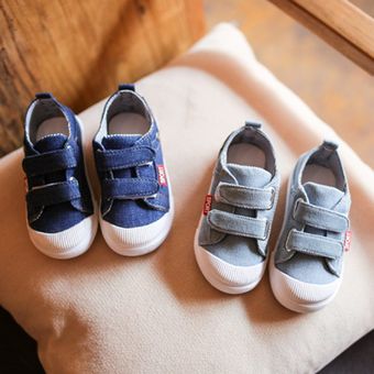 Zapatos de lona para niños unisex con suela de goma y cinta de nylon y decoraciones de remaches 