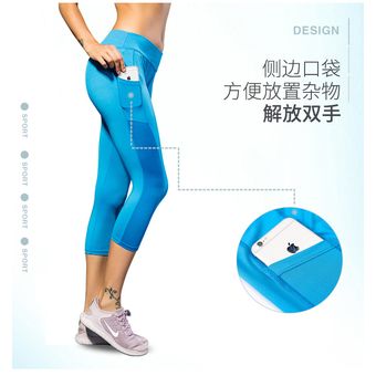 Las mujeres estiran los pantalones cortos de yoga deportivos con bolsillos Las mujeres estiran los pantalones cortos de yoga deportivos con bolsillos